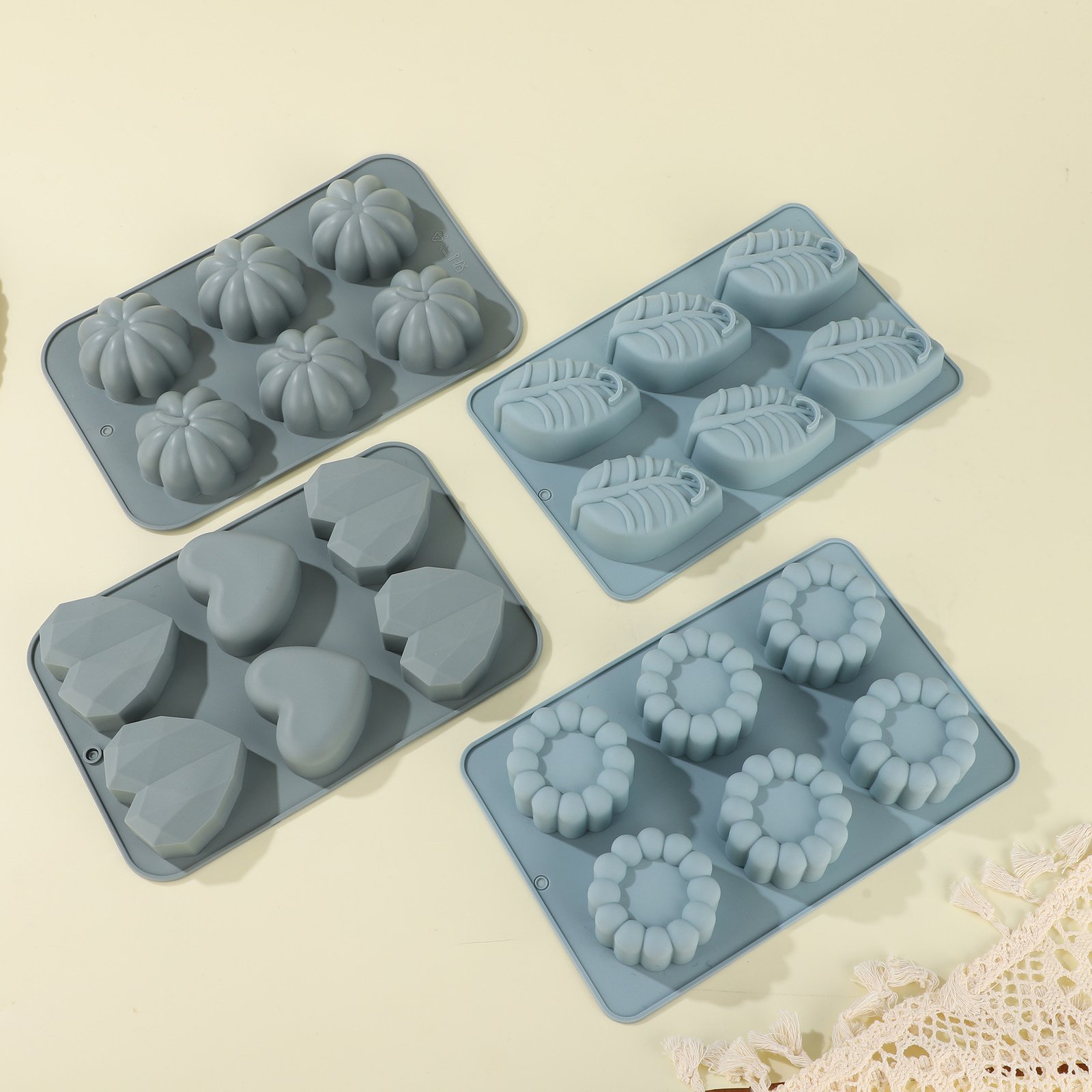 Blue silicone cake molds in a Kezon baking collection