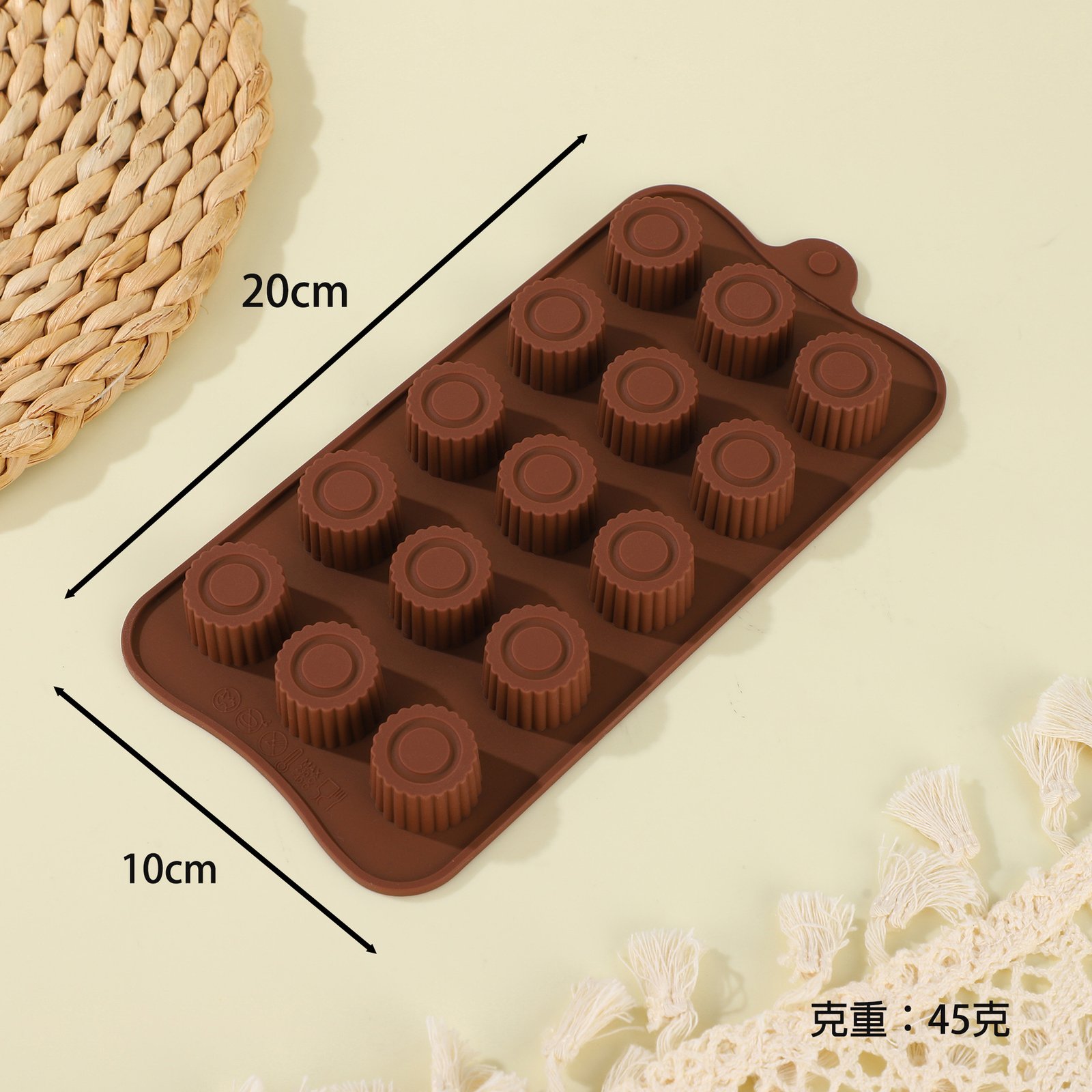 Procurement checklist beside chocolate mold samples and packaging